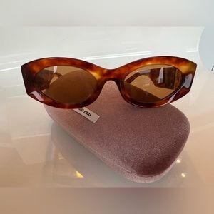 Miu Miu Sunglasses Oval Shape in Tortoise.  ZERO Scratches in Perfect Condition!